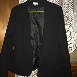 A black dress up jacket.